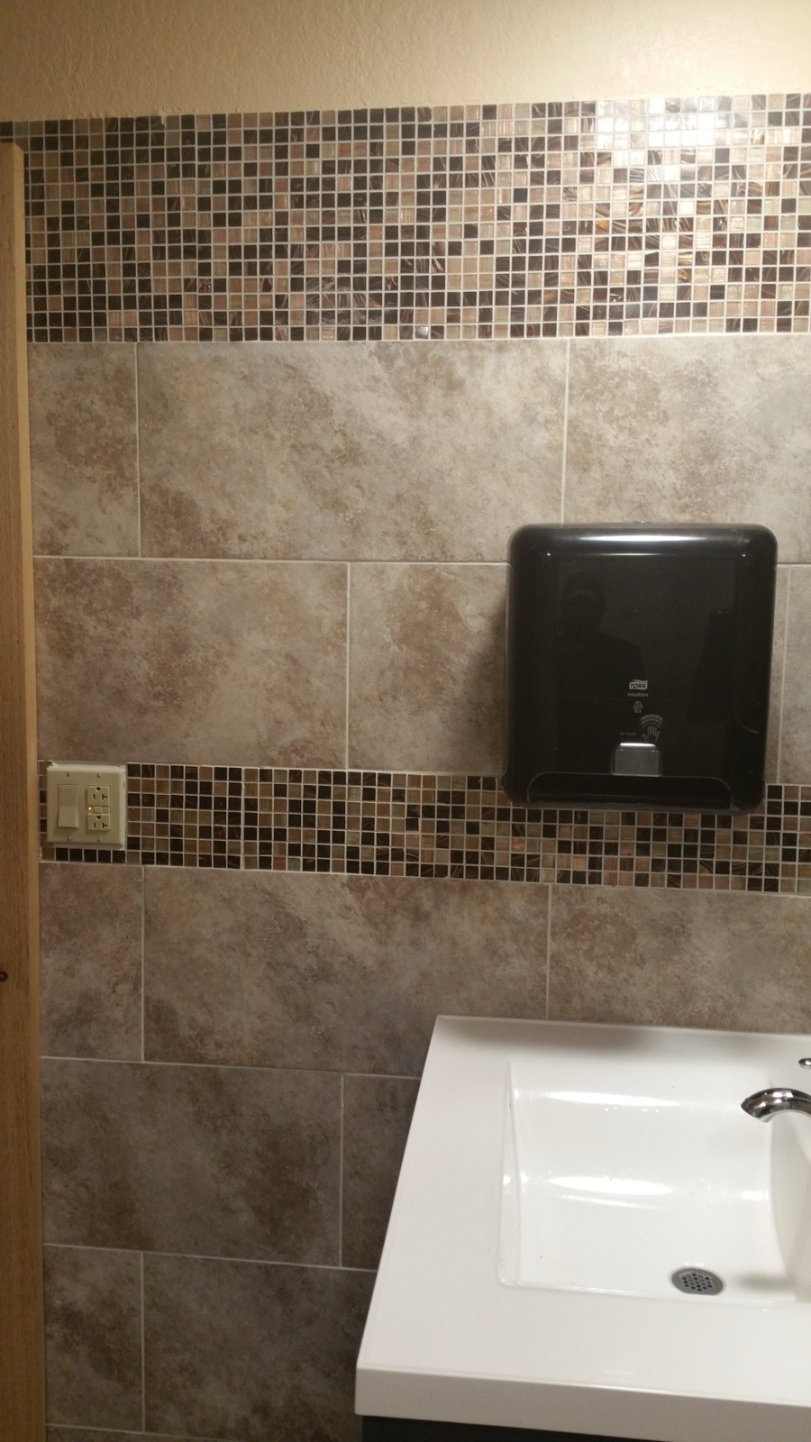 Commercial restroom tile and sink buildout